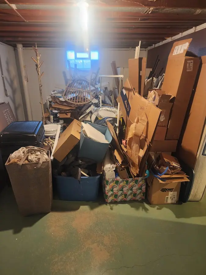 Roll-off dumpster container at job site for Roll Off Dumpster Rental in Canaan